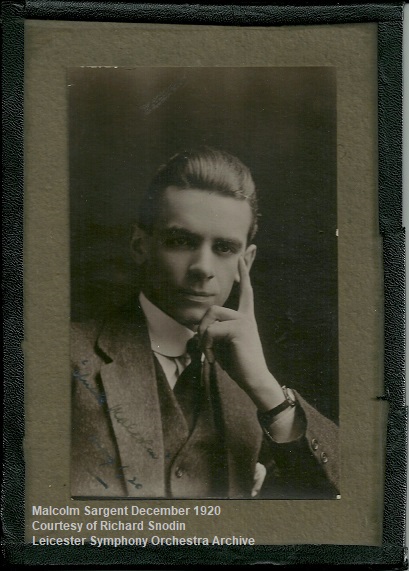 Malcolm Sargent in December 1920. Courtesy of Richard Snodin, Leicester Symphony Orchestra Archive. Malcolm Sargent as a young man in December 1920, seated, with the fingers of his left hand resting on his cheek
